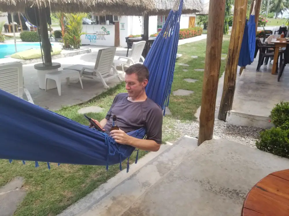 The Beach, a Sloth, and Monkey Lalas... - Reading "The Count of Monte Cristo" in hammock