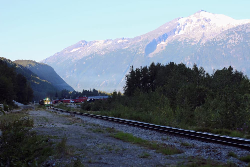 Designing Our New Life – The Power of Early Retirement - Train through the mountains of Alaska