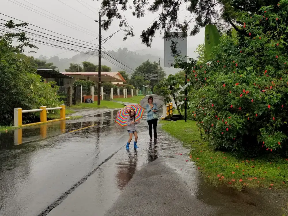 Faith and Lisa walking home in the rain...