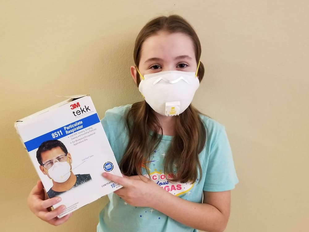 What I Did During My First Week Off in 6 Years! - Faith demonstrating our N95 mask stash