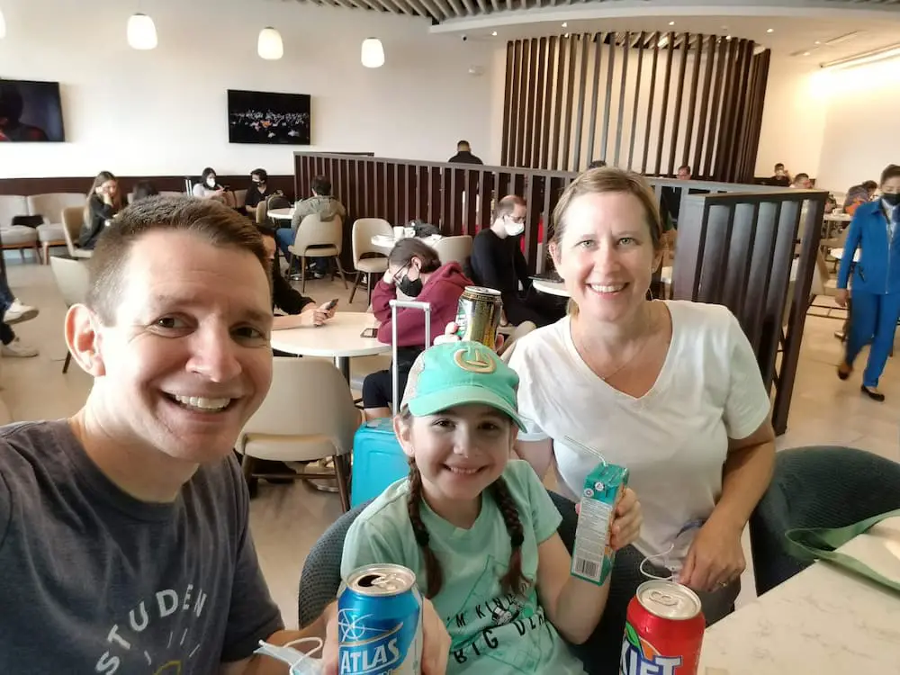 Why I Decided To Open a Credit Card With a Massive $395 Annual Fee - Jim, Faith, and Lisa at an airport lounge at Tocumen International Airport (PTY) in Panama