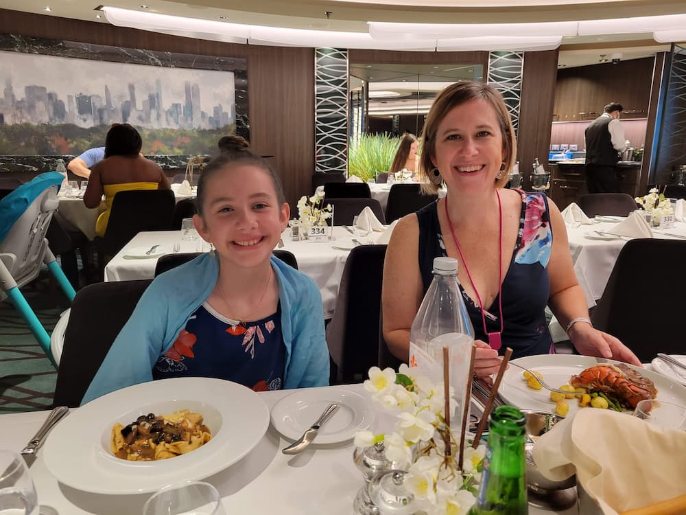 Cruise Vacations – My 3 Rules and My 3 Favorite Indulgences - Faith and Lisa at dinner in the MDR